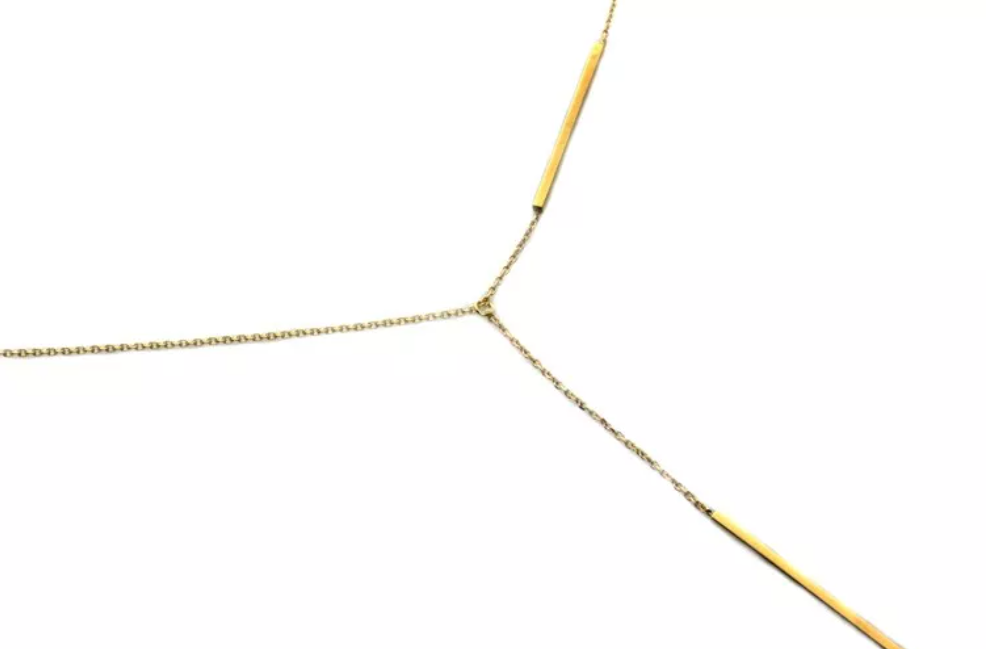 Minimalistický zlatý visiaci náhrdelník s jemnými tyčinkami